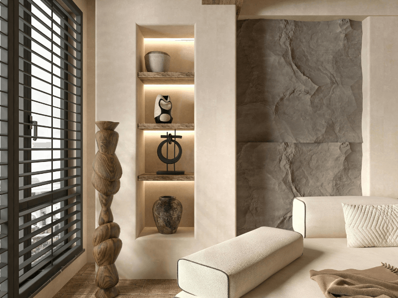 Living room with a lit stone niche, sculptural wood decor and a cream bench
