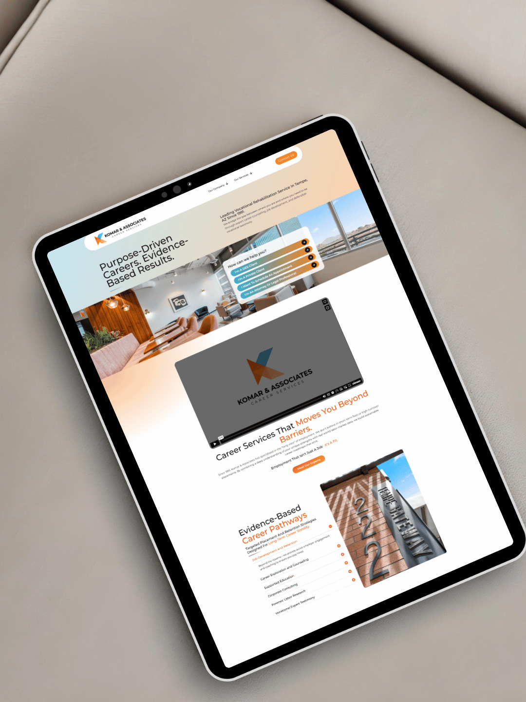 Komar and Associates homepage on a tablet