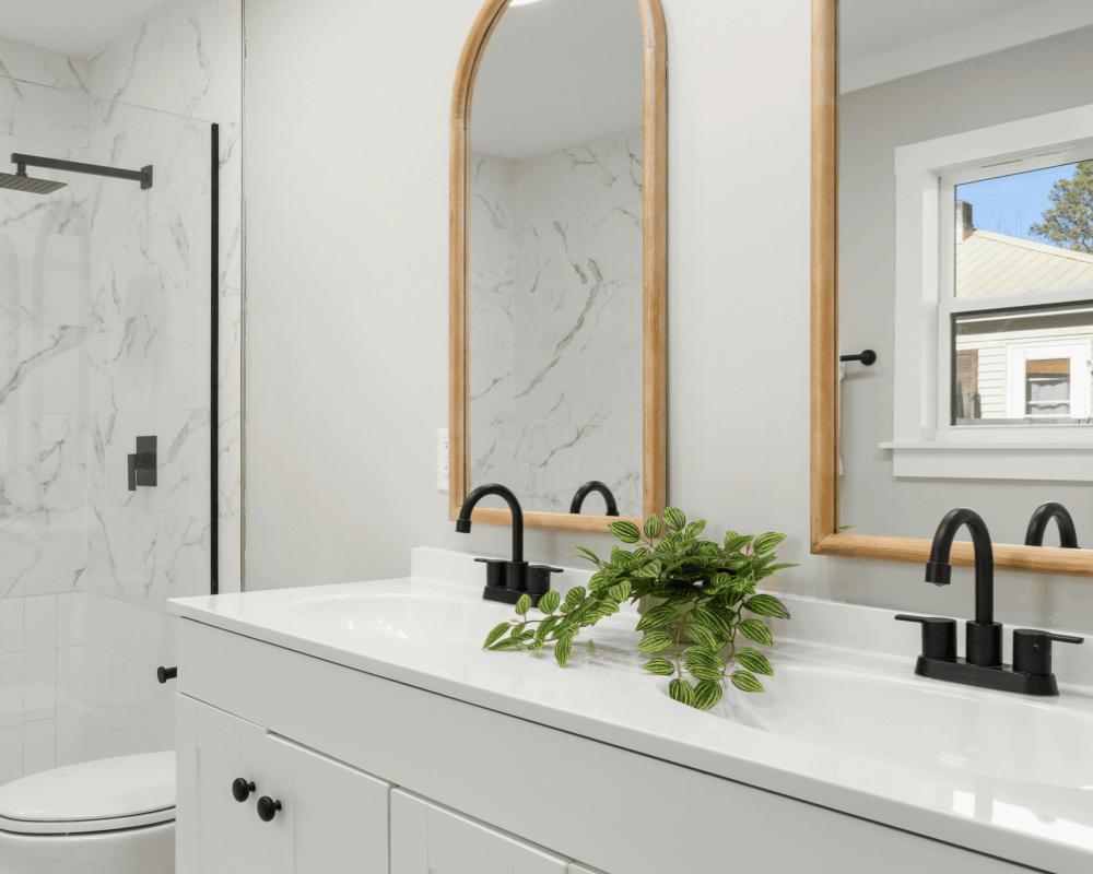 Pruitt plumber installing a bathroom faucet