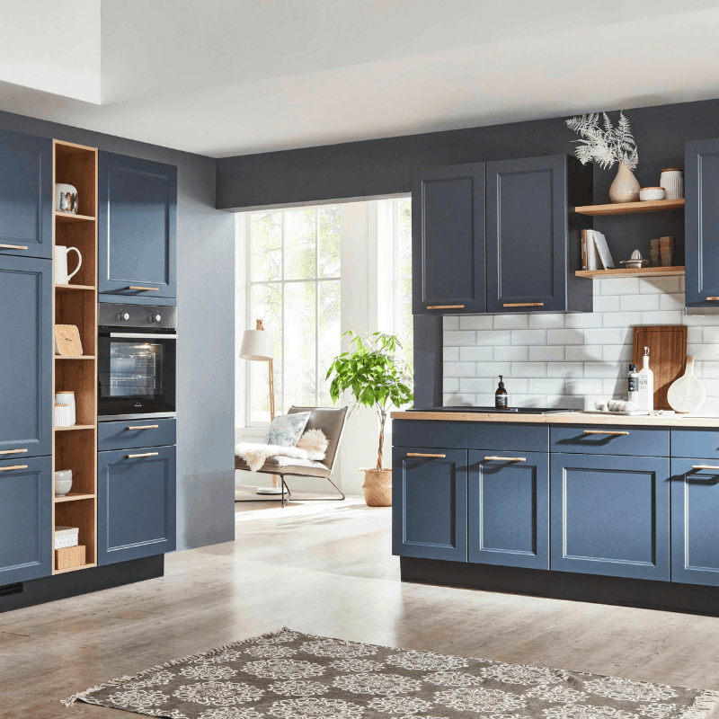 Wes installing kitchen cabinets in a Boise home