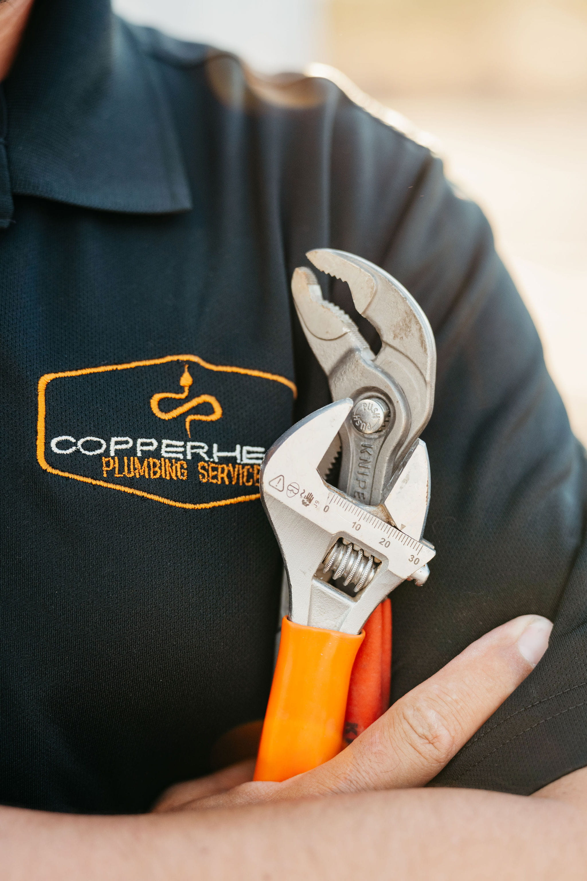 Copperhead Plumbing tools and company logo from the brand photo shoot