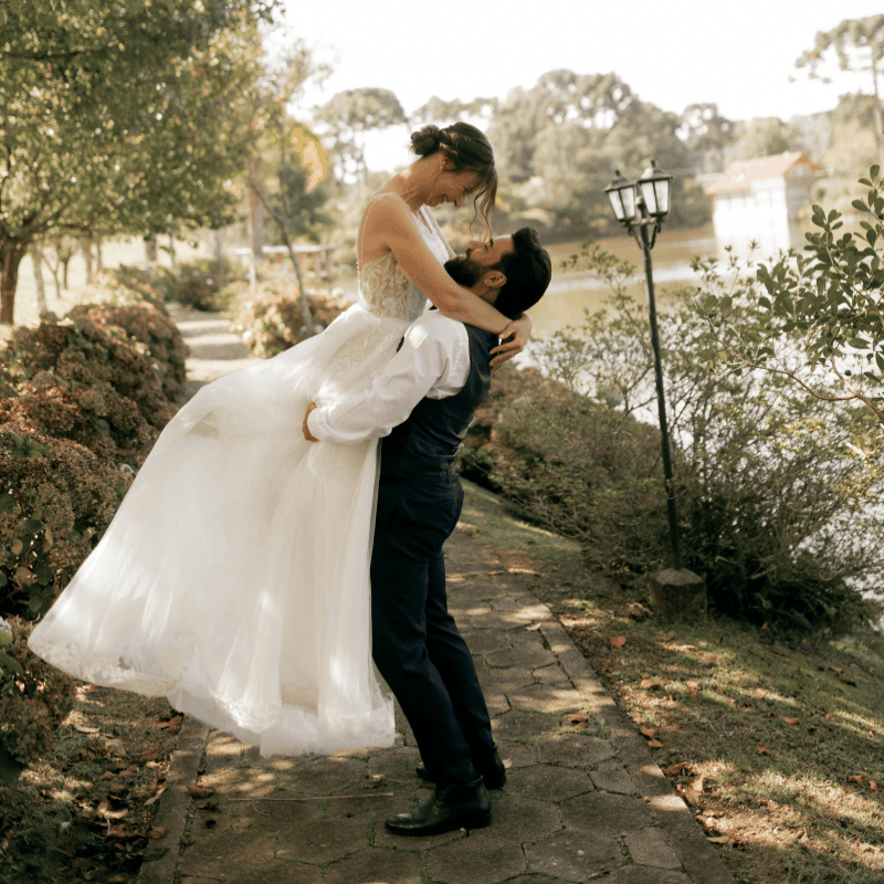 Bride and groom posing together for portraits