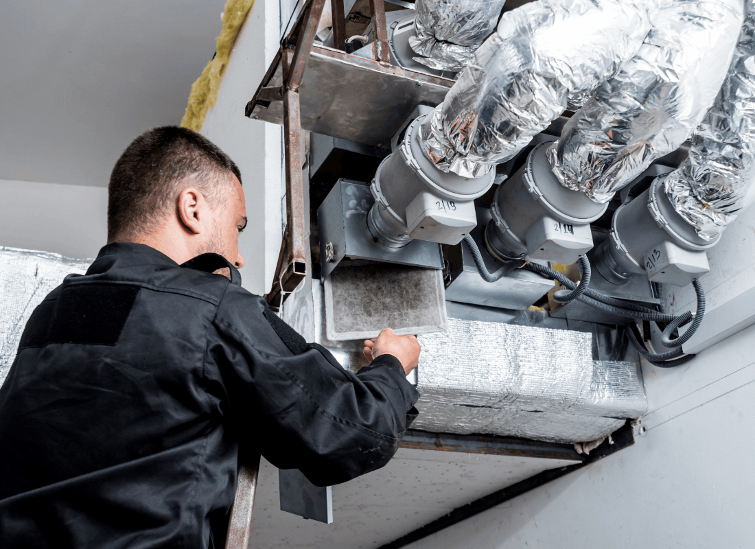 SB Heating & Air technician with service equipment