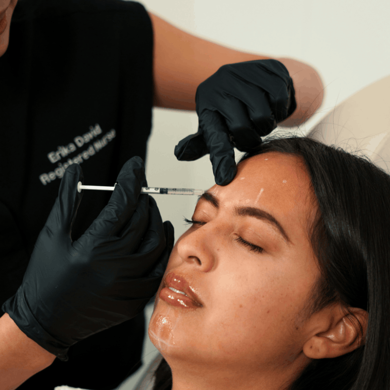 Licensed provider administering an injectable treatment