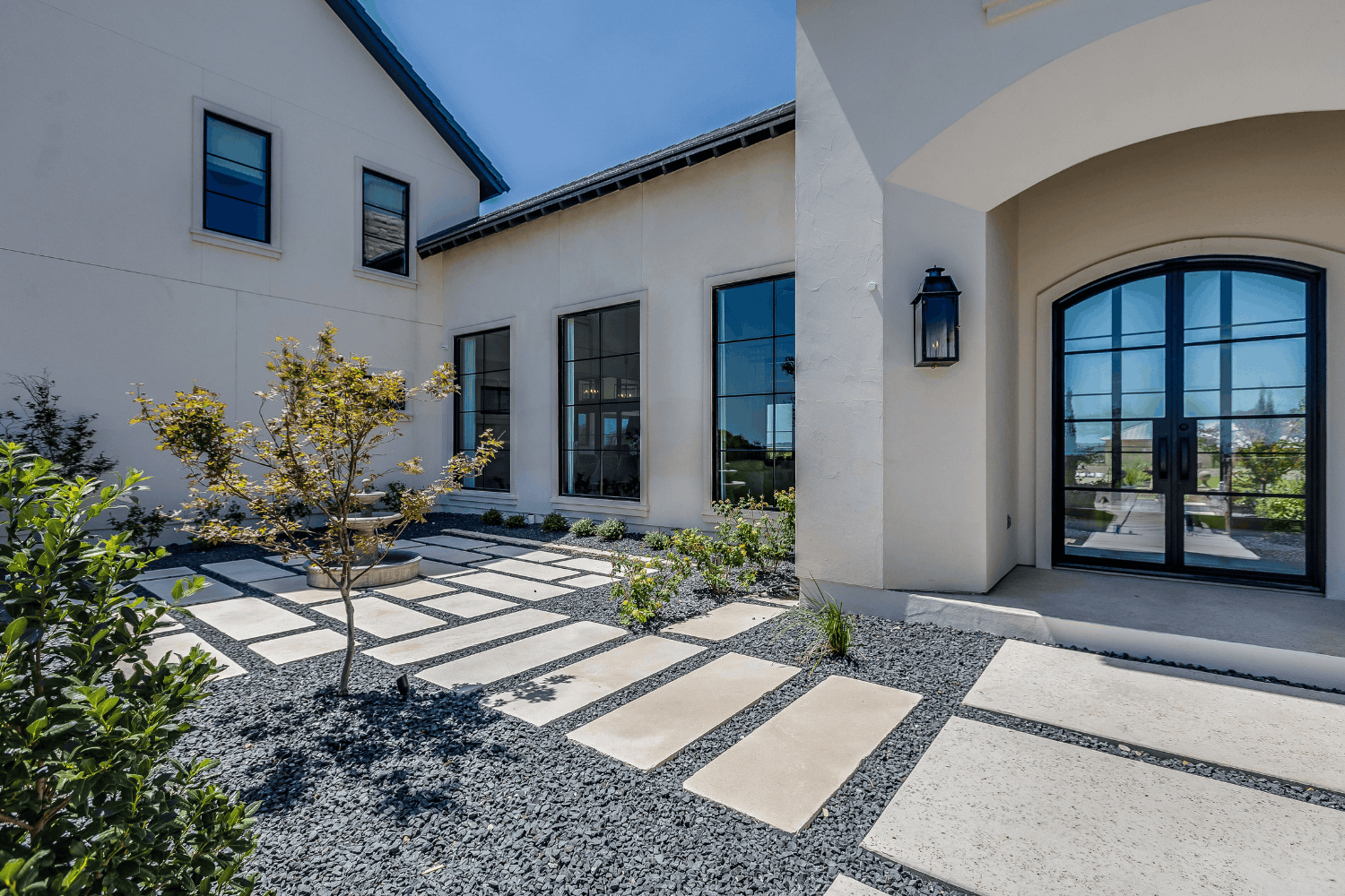 Stone courtyard at a Holloway custom home