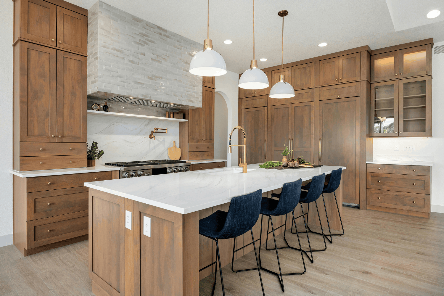 White oak kitchen with stone counters in a Reno custom home