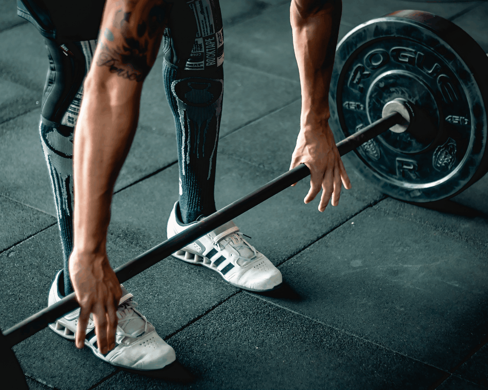 Weight training stations inside a private gym