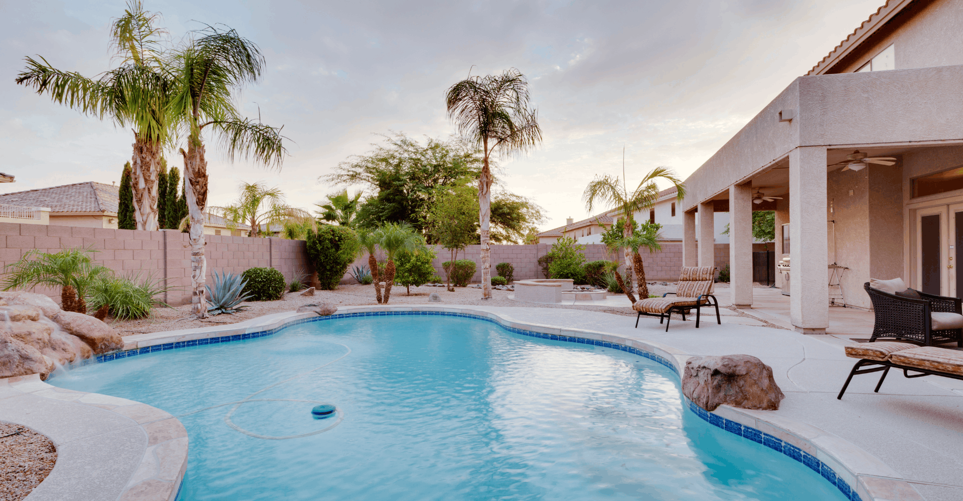 Sparkling backyard swimming pool on a sunny day