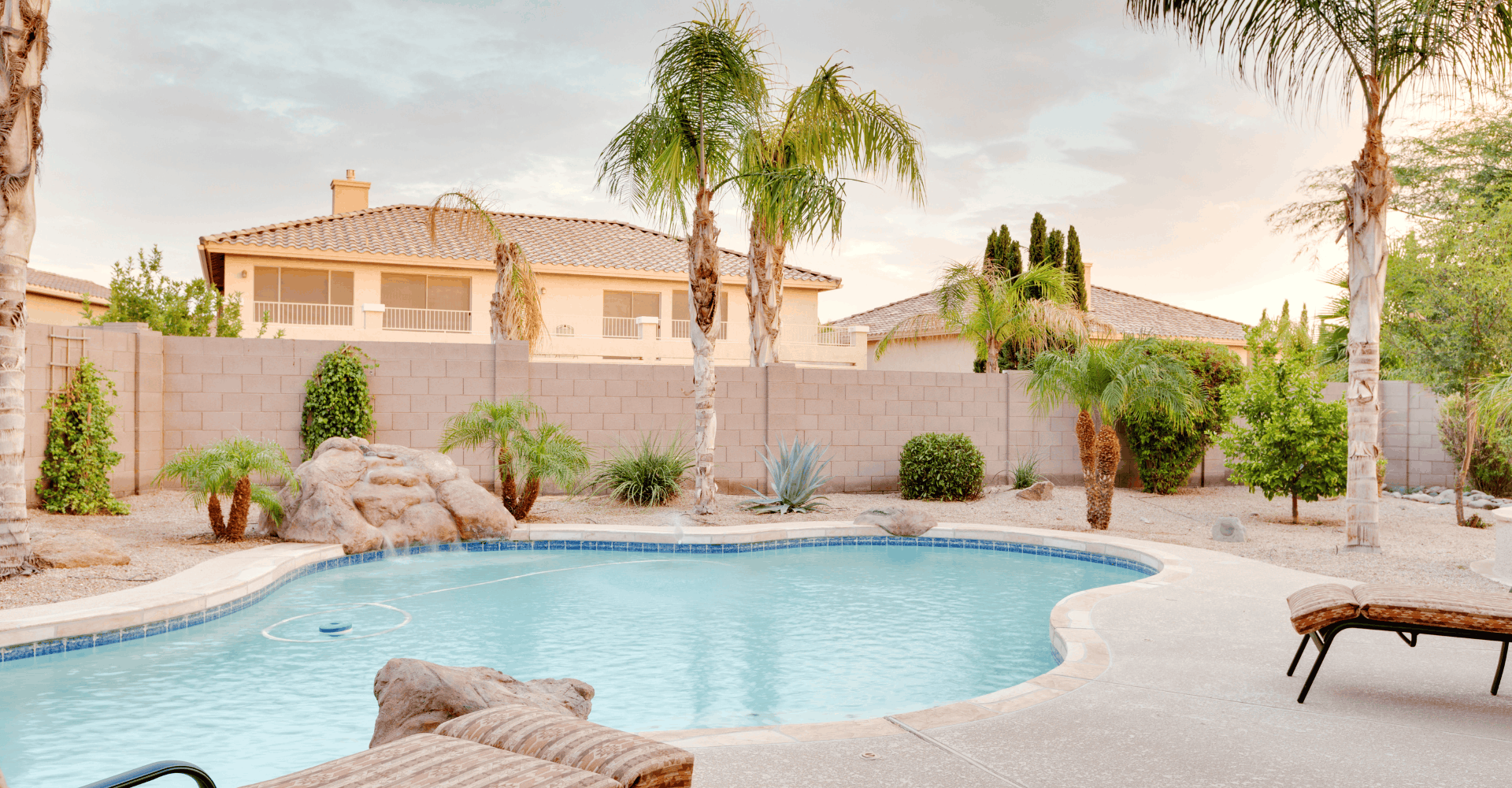 Clean backyard pool and patio on a sunny Tucson afternoon