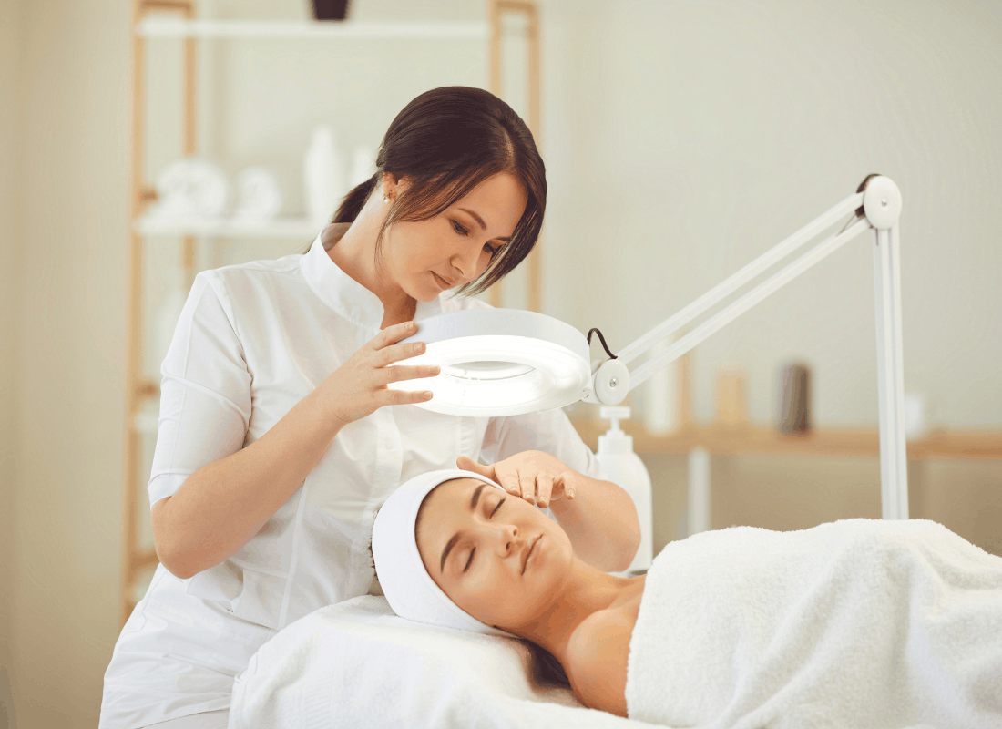 Esthetician preparing a facial appointment
