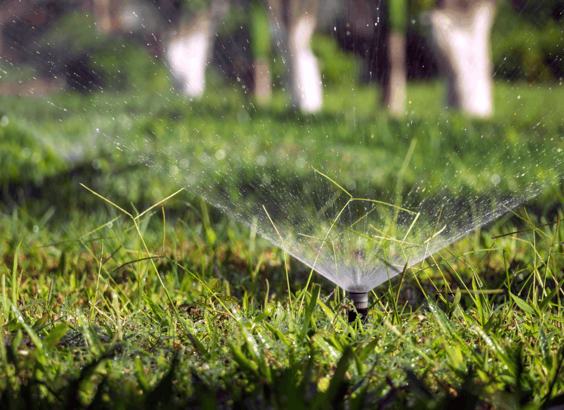 Sprinkler head being repaired