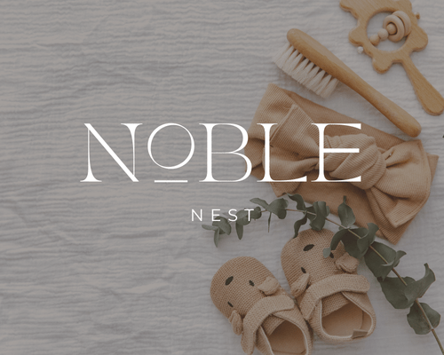 Logo design concept for Noble Nest, a kids clothing boutique, featuring baby clothes and items in the background, created by Sprout Marketing and Design in Chandler, AZ, representing a stylish and cozy brand for children’s apparel